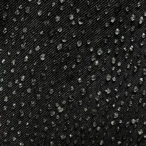 Crystal-embellished denim close-up